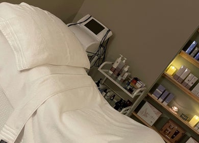Relaxing treatment room at The Skin Corner by Amy, Shaftesbury, England, GB, featuring a plush treatment bed.