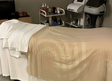 Elegant spa treatment bed at The Skin Corner by Amy, Shaftesbury, England, GB. Experience ultimate relaxation.