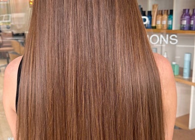 Back view of sleek, long hair inside Veronica Capri Beauty Salon Sydney, New South Wales, AU.