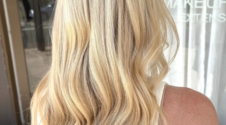 Blonde wavy hairstyle at Veronica Capri Hair Salon Sydney, Bondi Junction, New South Wales, AU.