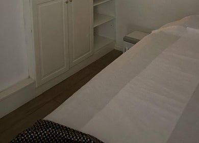 Calm massage room at U&I Thai Spa (Inside Elite Nail), London, England, GB. Cozy and serene environment.