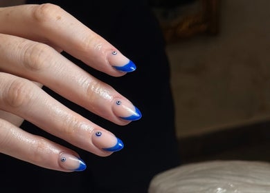 Elegant blue-tipped manicure at Heavenly Aesthetics, Stoke-on-Trent, England, GB.