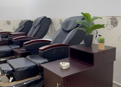 Massage chairs at Serenity Glamour, Germiston, Gauteng, ZA, offering ultimate relaxation in a serene setting.