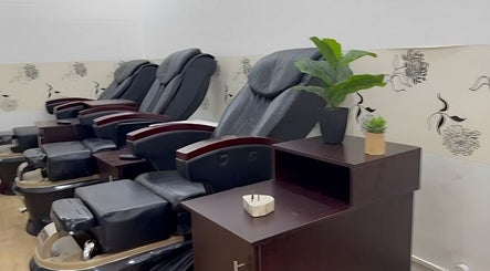 Massage chairs at Serenity Glamour, Germiston, Gauteng, ZA, offering ultimate relaxation in a serene setting.