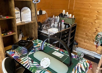 Nail care station at Green Cabin Beauty in Mill Meadows, Newport, England, GB showcasing tools and products.