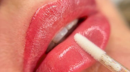 Close-up of glossy lips treatment at Skinart By K, London, England, GB.