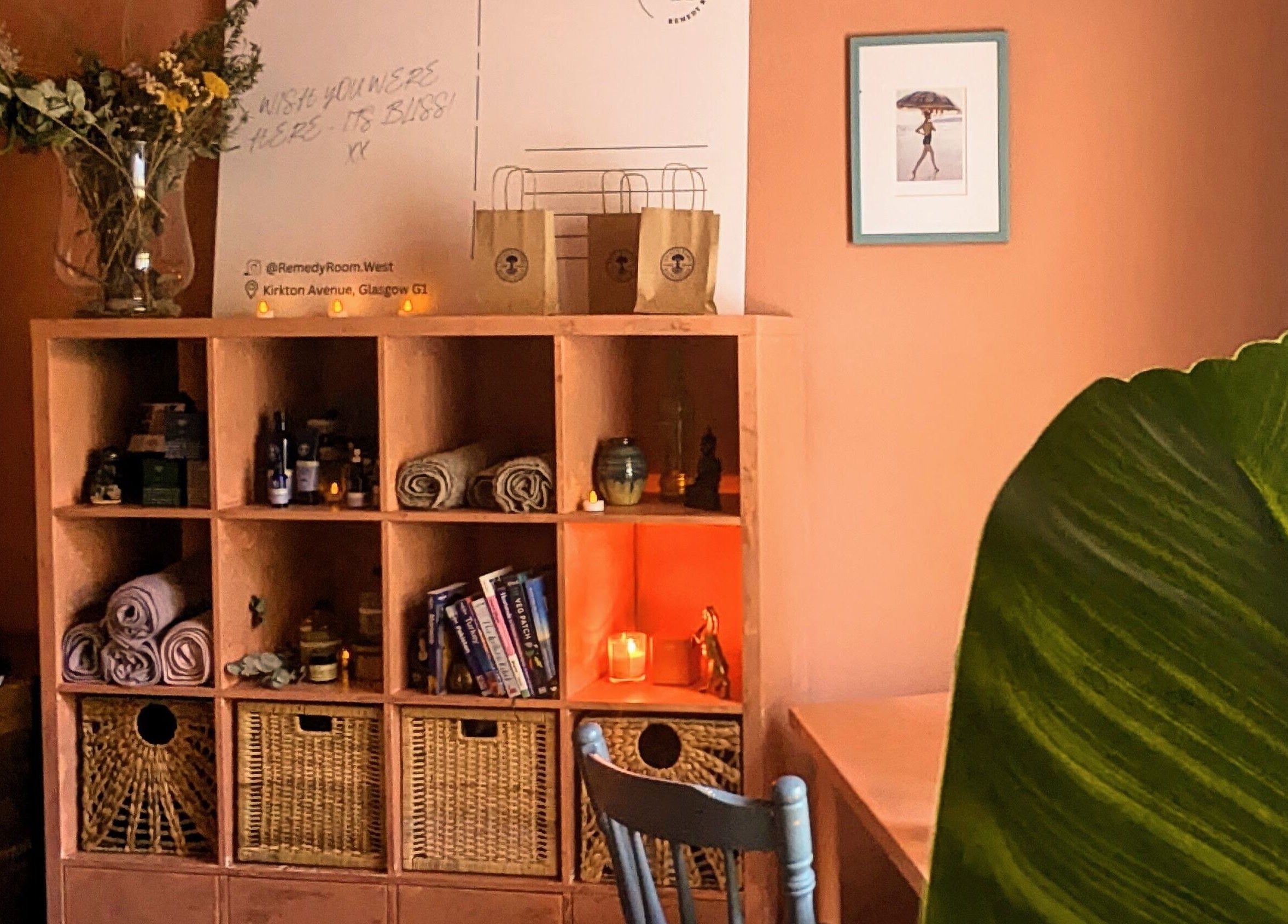 Warm and inviting shelf at Remedy Room West, Glasgow, Scotland, GB, offering a serene beauty and wellness ambience.