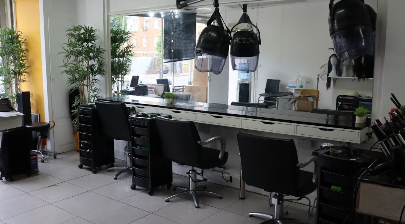 Modern styling chairs and equipment at Majestic Hair Design, London, England, GB.