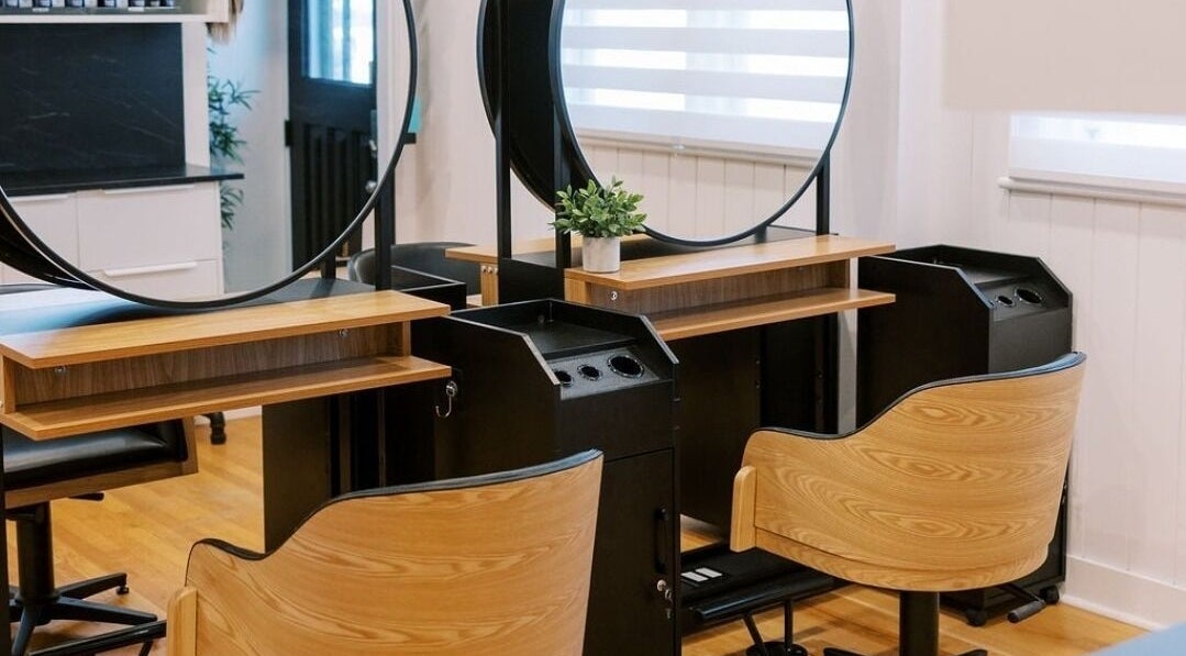 Modern styling station at Mane West Salon, Ottawa, Ontario, CA showcases sleek design and comfort.