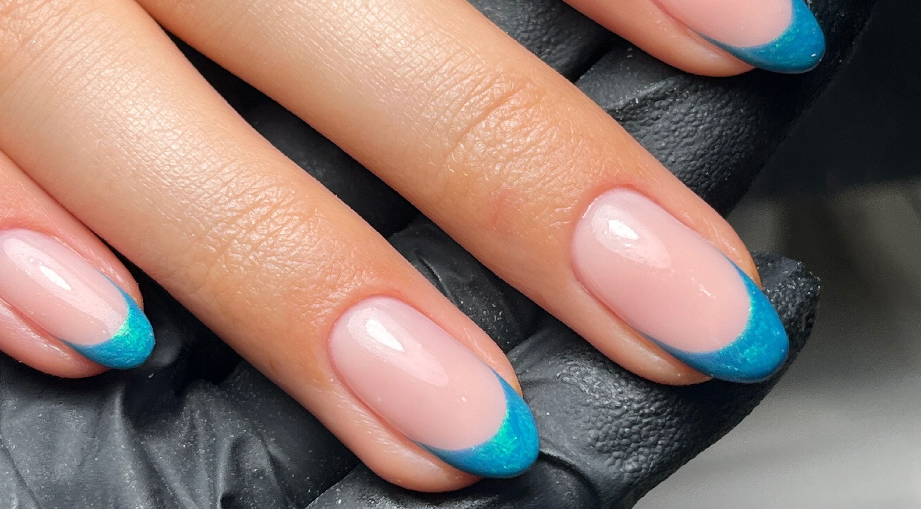 Stylish blue-tip French manicure at Caitlin Heasley Nails, Aghalee, Northern Ireland, GB.