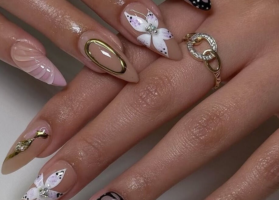 Elegant nail art with floral designs at J P Nail Spa, Vaughan, Ontario, CA.