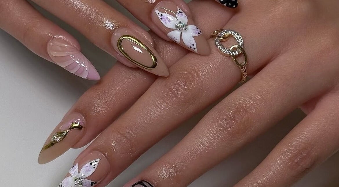 Elegant nail art with floral designs at J P Nail Spa, Vaughan, Ontario, CA.