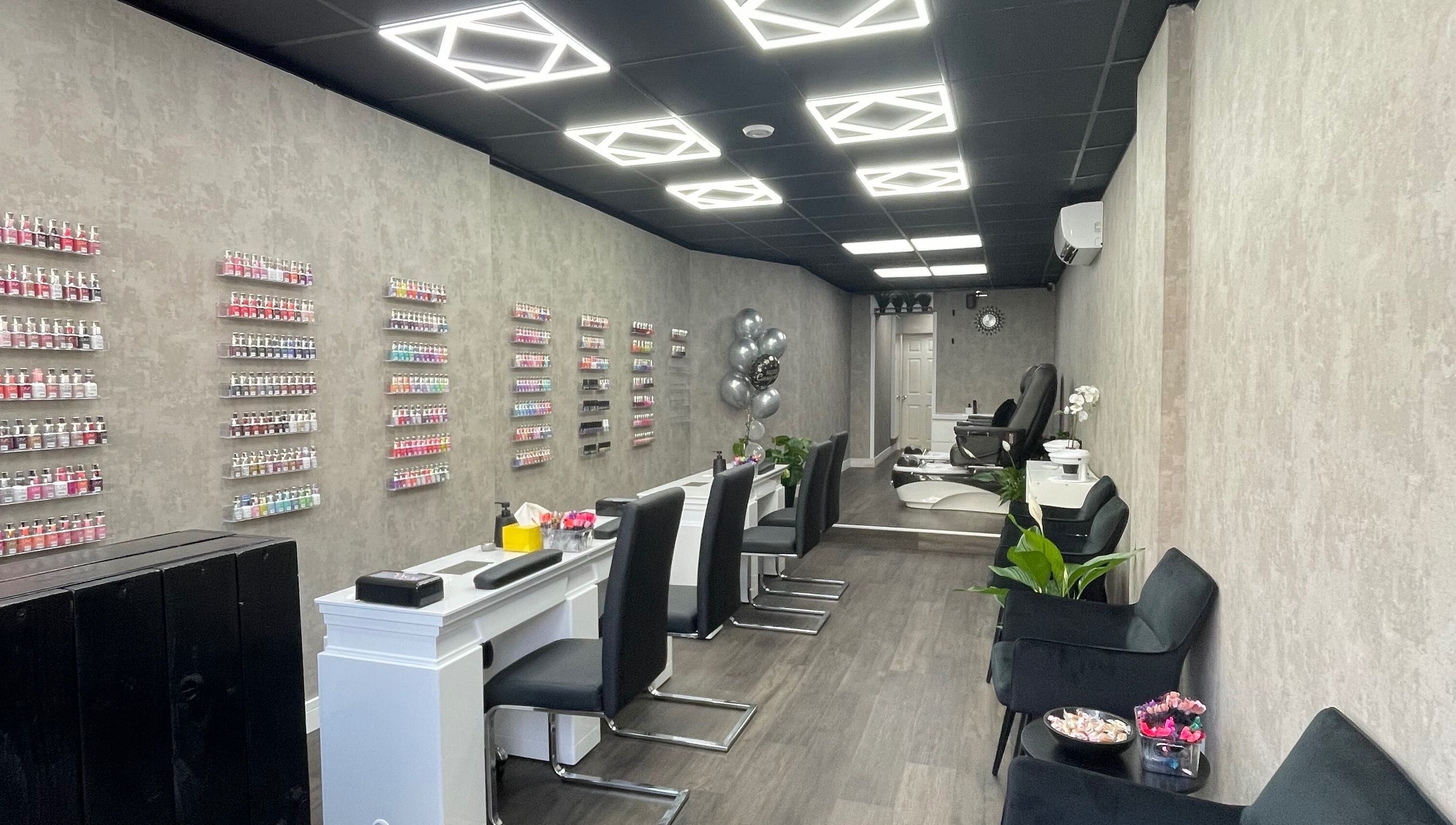 Stylish nail salon at Black Angel, Cardiff, Wales, GB with elegant decor and modern seating.
