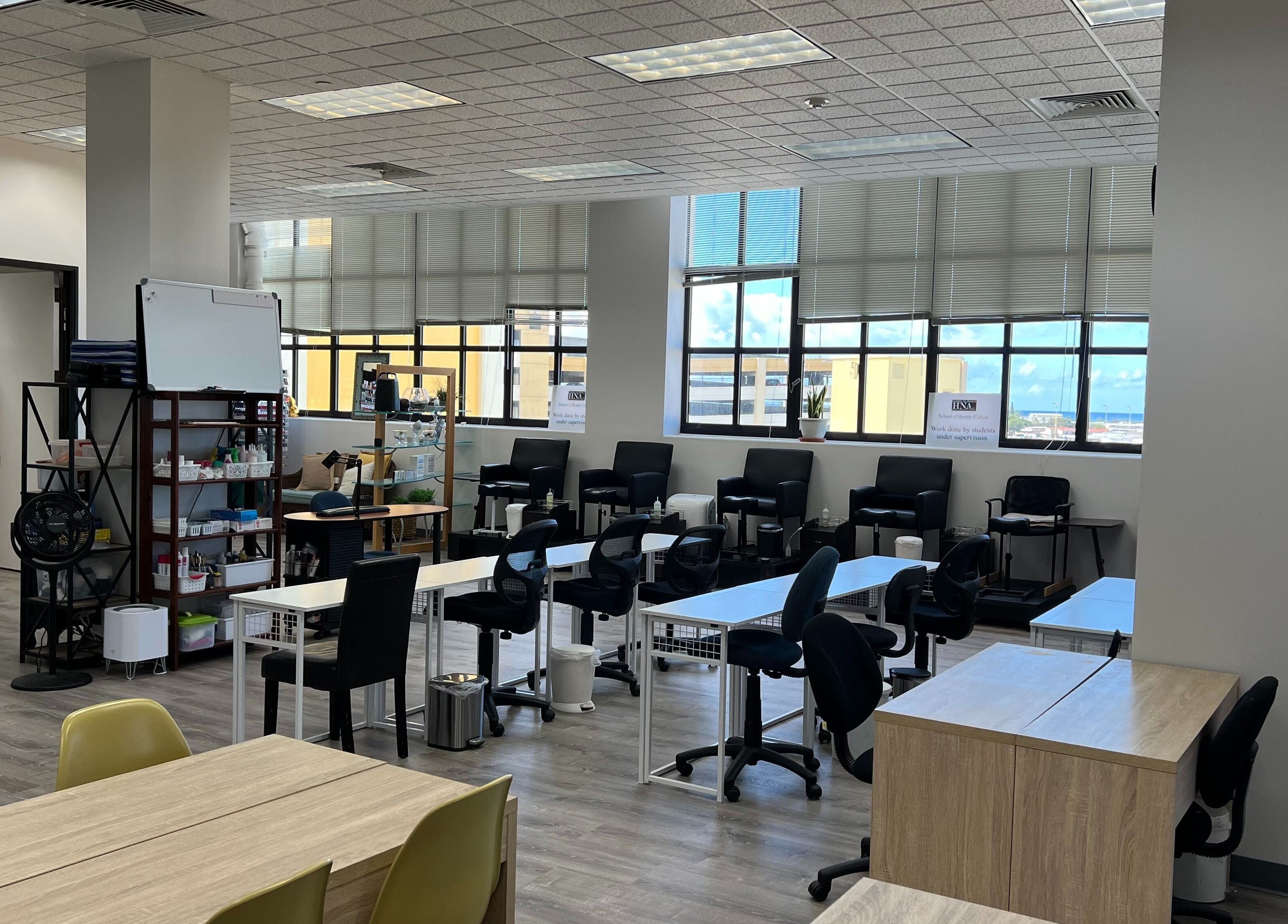 Modern classroom at HNA Est Hybrid Online Students, Honolulu, Hawaii, US with desks and chairs.