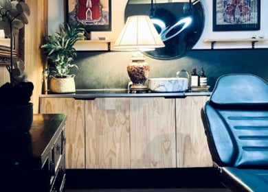 Elegant interior of Browow: Brows & Lips That Stay salon in Melbourne, Victoria, AU featuring cozy seating.