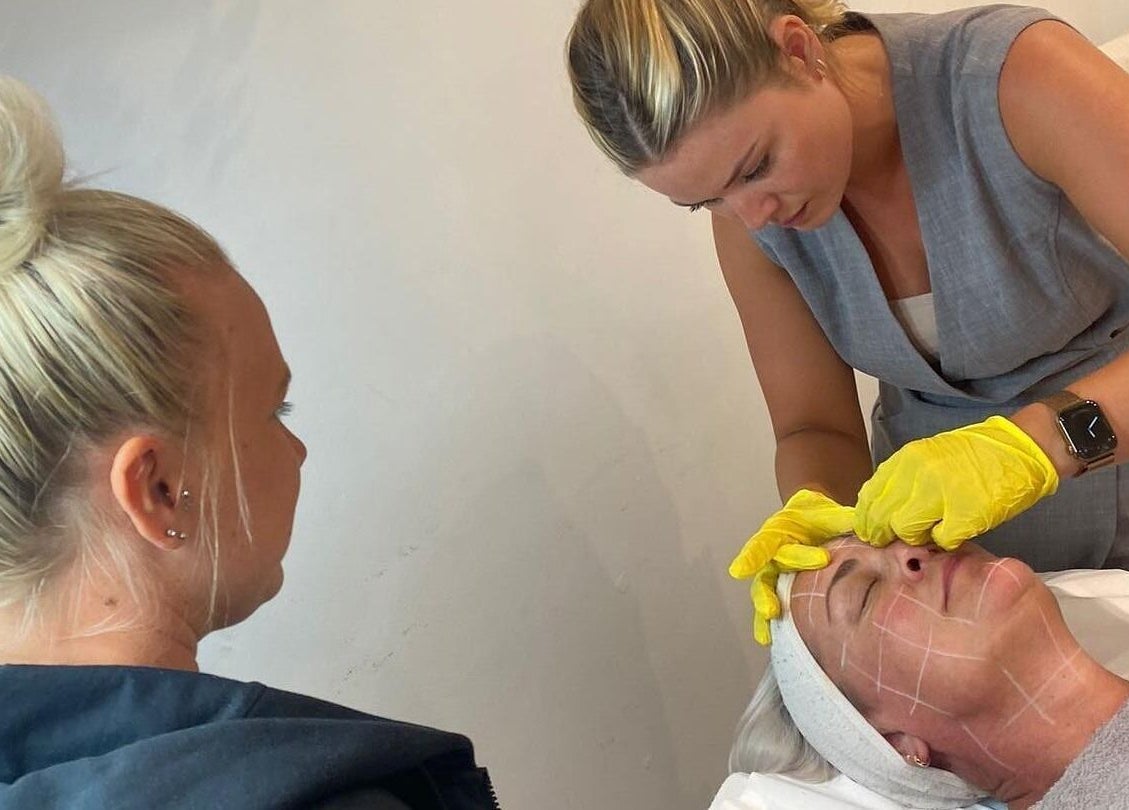 Facial treatment at Harper Victoria Aesthetics in Bristol, England, GB, showcasing expert skin care techniques.