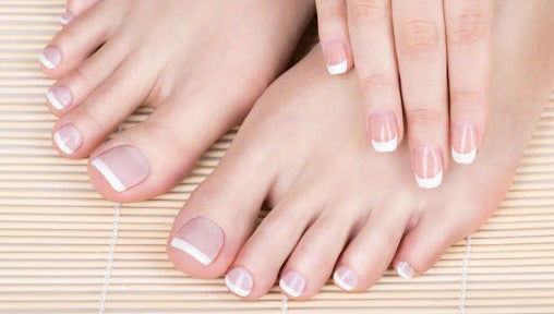 French manicure and pedicure at Marie’s Nail Loft, Bonner Springs, Kansas, US, showcasing elegance.