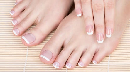 French manicure and pedicure at Marie’s Nail Loft, Bonner Springs, Kansas, US, showcasing elegance.