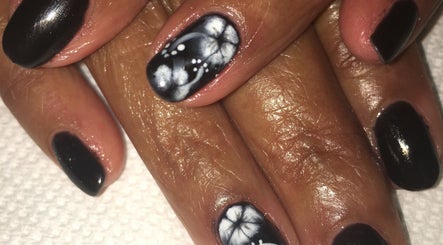 Elegant black and white floral nail art at Marie's Nail Loft, Bonner Springs, Kansas, US.