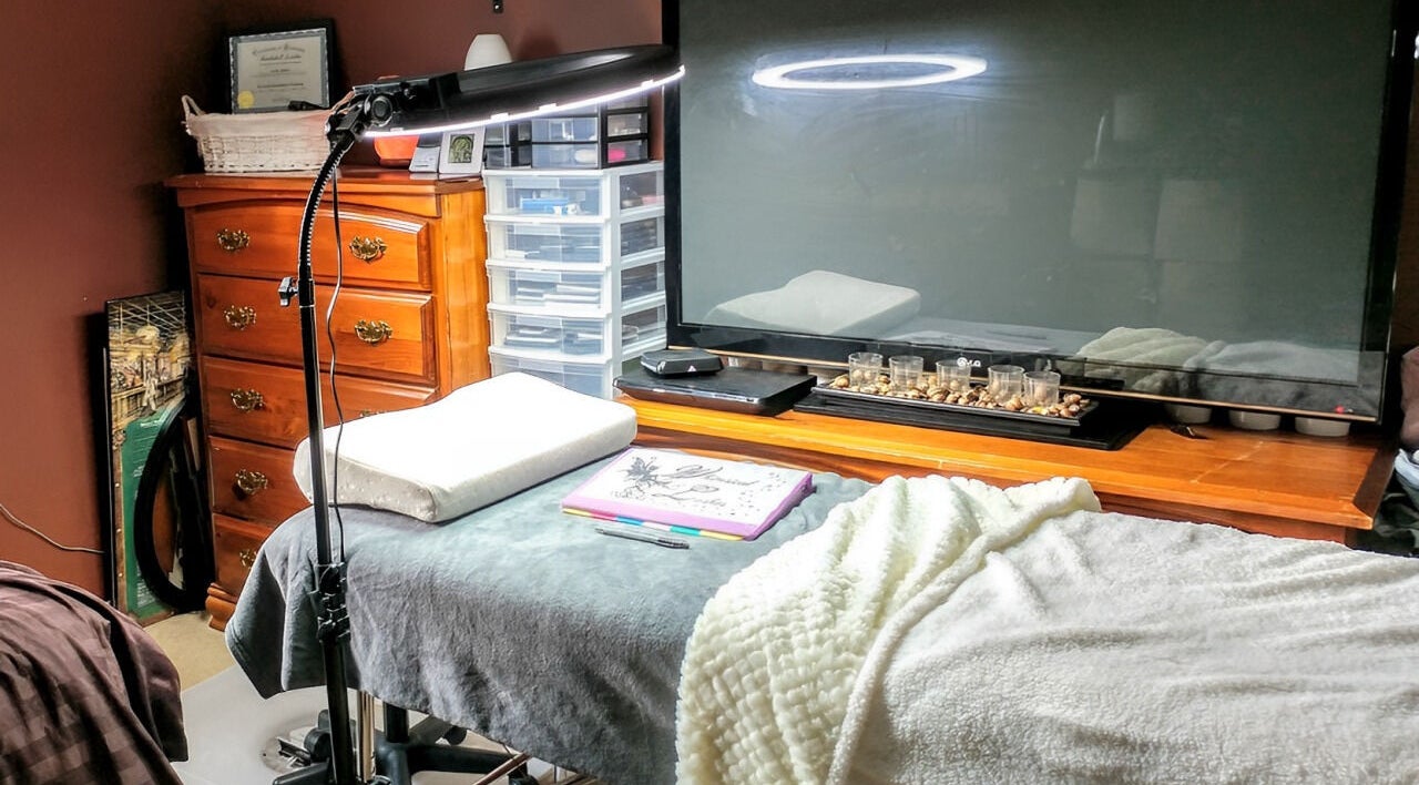 A cozy treatment area at Embellished Beauty - Dundalk 52 Main St E, Dundalk, Ontario, CA with elegant decor and soft lighting.