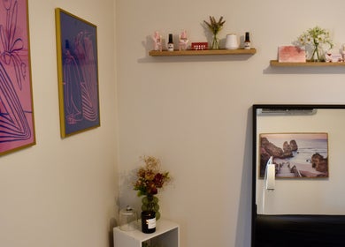 Stylish beauty room at Brookelyn Beauty, Perth, Western Australia, AU featuring vibrant wall art and chic decor.