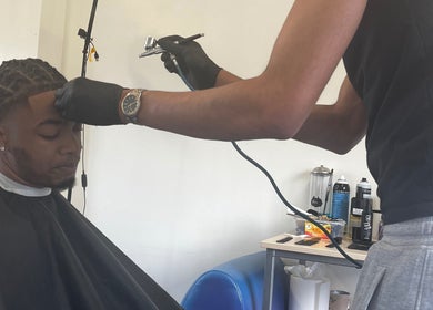 Expert hairstylist at Jujucutthat applies hair treatment, Loughborough, England, GB.