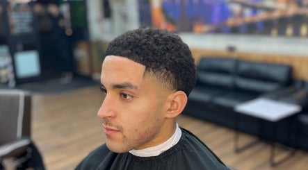 Stylish men's haircut at Jujucutthat, Loughborough, England, GB, showcasing expert grooming.