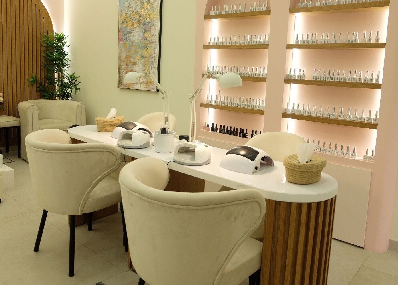 Chic nail salon at Fab & Fancy I فاب آند فانسي, الرياض, منطقة الرياض, SA, featuring plush seating and polish display.