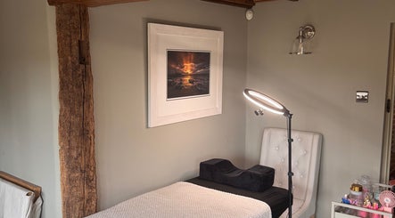 Cozy treatment room with elegant decor at Enhanced by El, Peldon, England, GB.