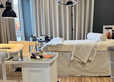 Comfortable treatment room at Brows By Jenna, Northampton, England, GB with a plush bed and calming decor.