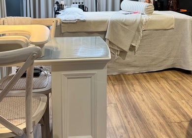 Elegant treatment room at Brows By Jenna in Northampton, England, GB featuring a cozy bed and stylish decor.