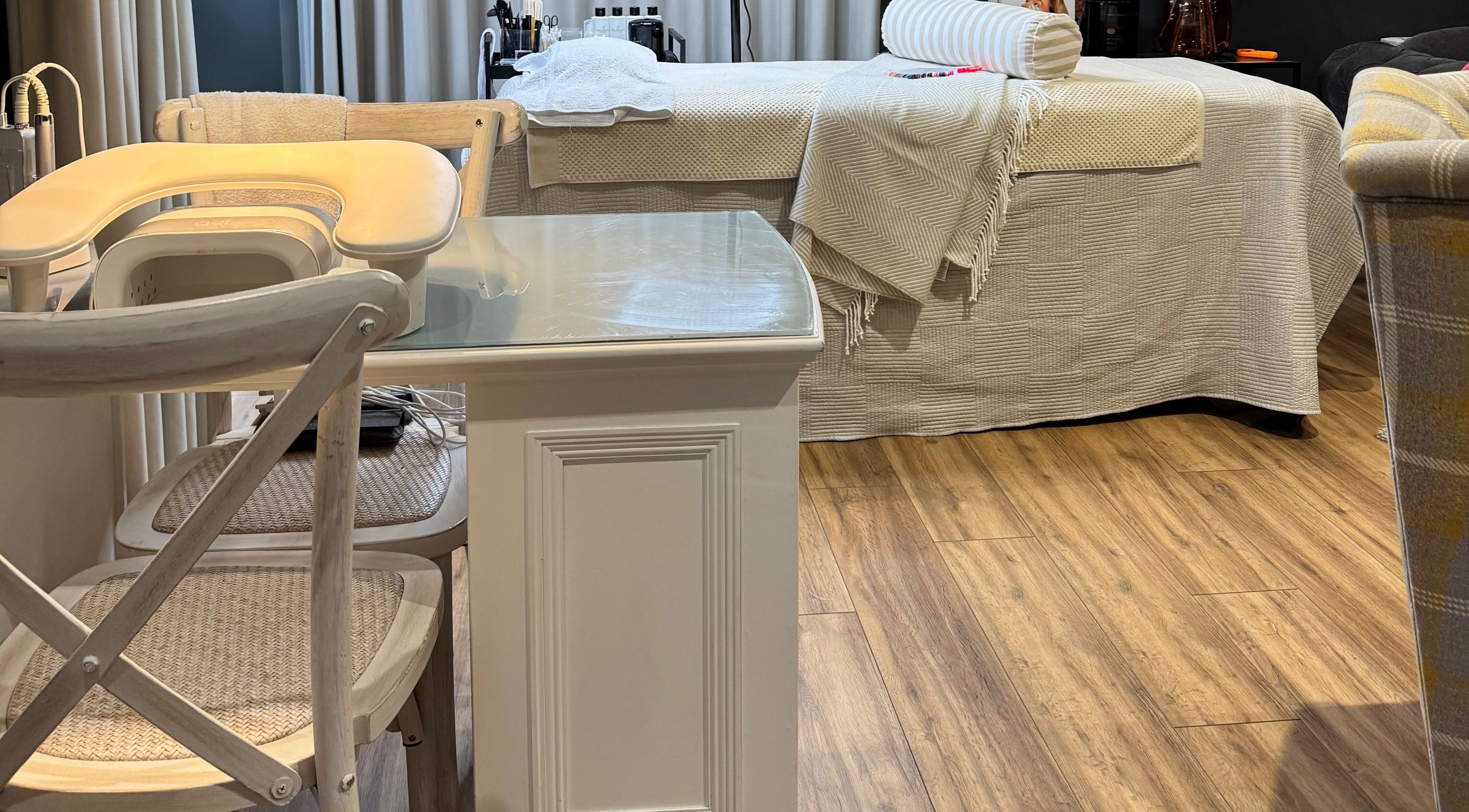 Elegant treatment room at Brows By Jenna in Northampton, England, GB featuring a cozy bed and stylish decor.