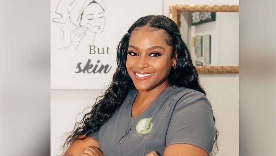 Smiling professional at Unblemished by Tish (FLORIDA), Davie, Florida, US, embodying wellness and beauty expertise.