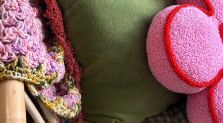 Colorful textured cushions at Holly Coukham Nails and Brows, Hemsworth, England, GB for a welcoming ambiance.