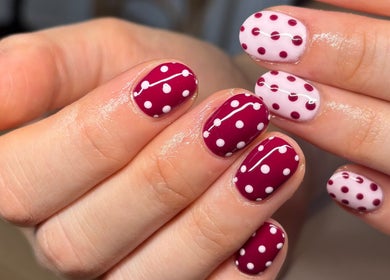 Stylish polka dot nail art at Holly Coukham Nails and Brows, Hemsworth, England, GB.