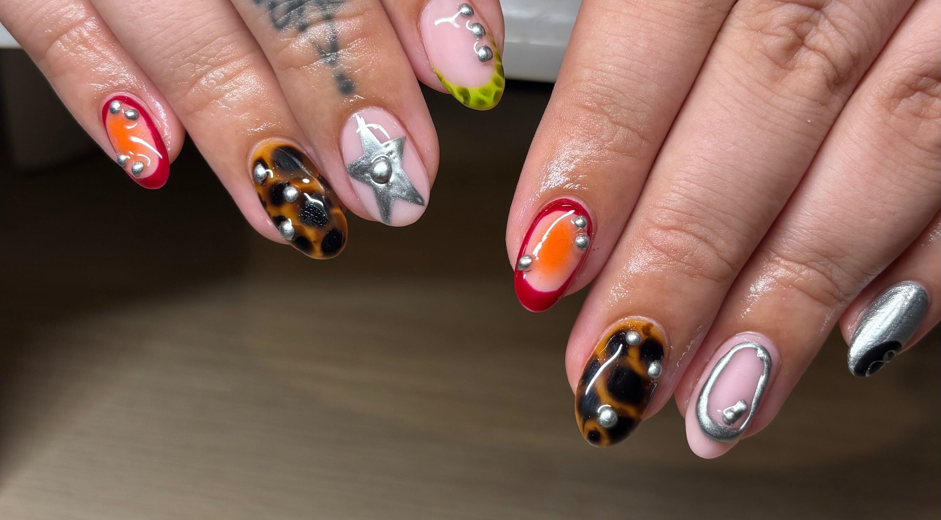 Unique nail art design at Holly Coukham Nails and Brows, Hemsworth, England, GB showcasing vibrant styles.