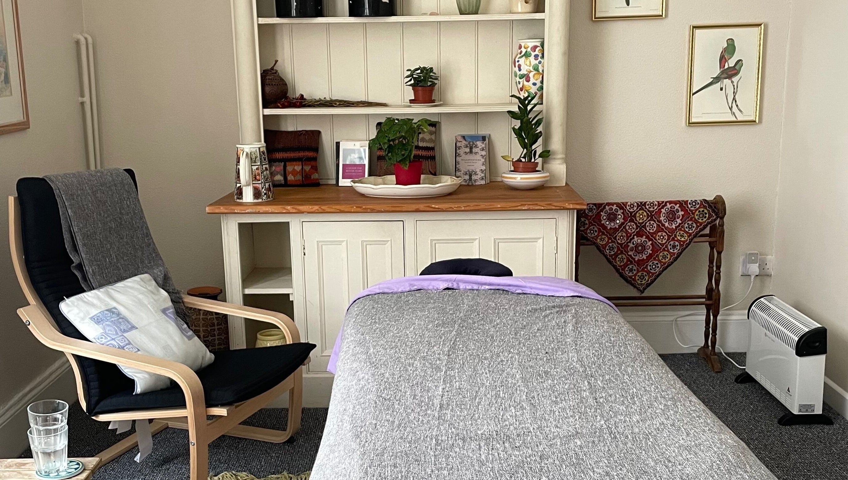 Inviting massage room at Maple Leaf Massage Cardiff in Cardiff, Wales, GB with a cozy chair and calming decor.