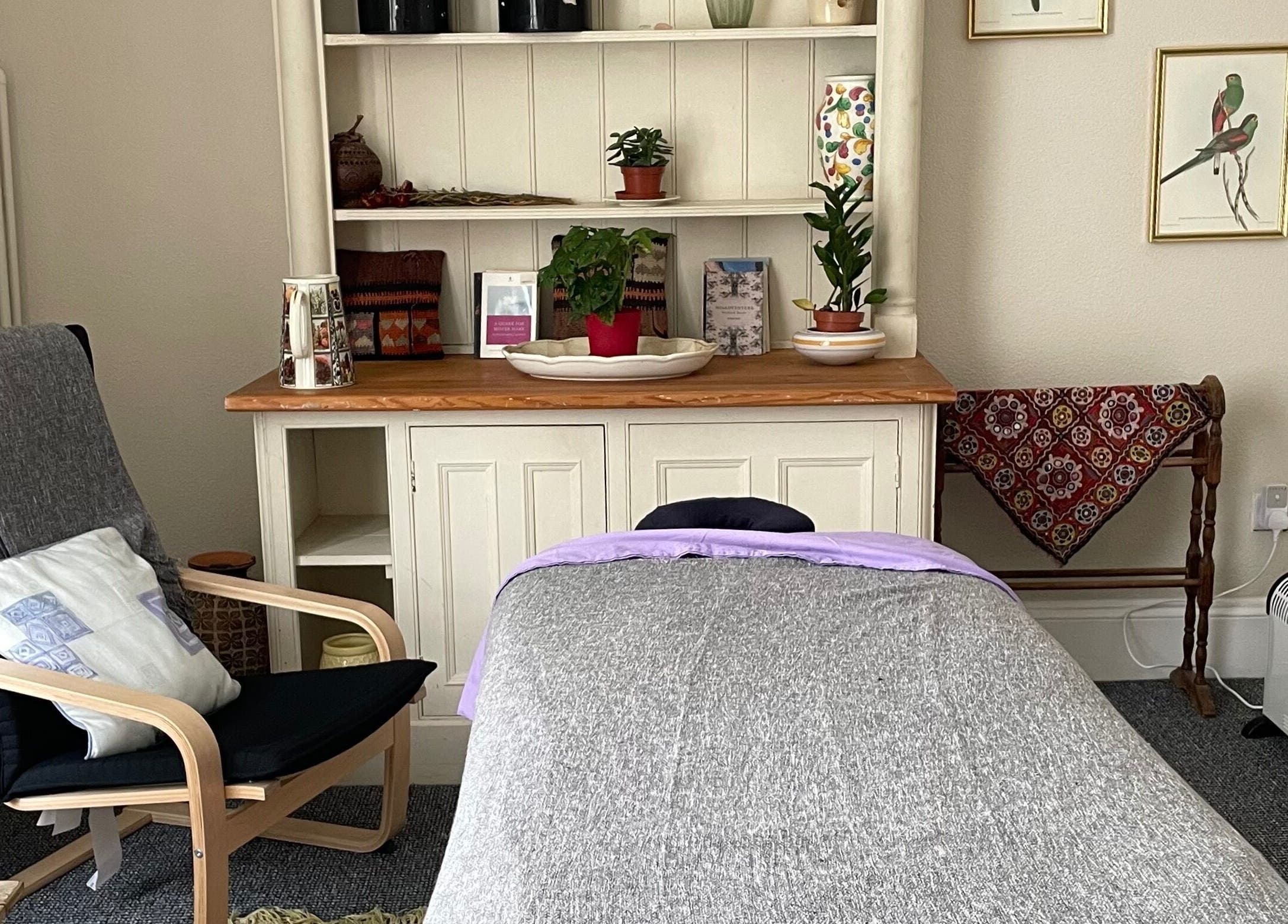 Inviting massage room at Maple Leaf Massage Cardiff in Cardiff, Wales, GB with a cozy chair and calming decor.
