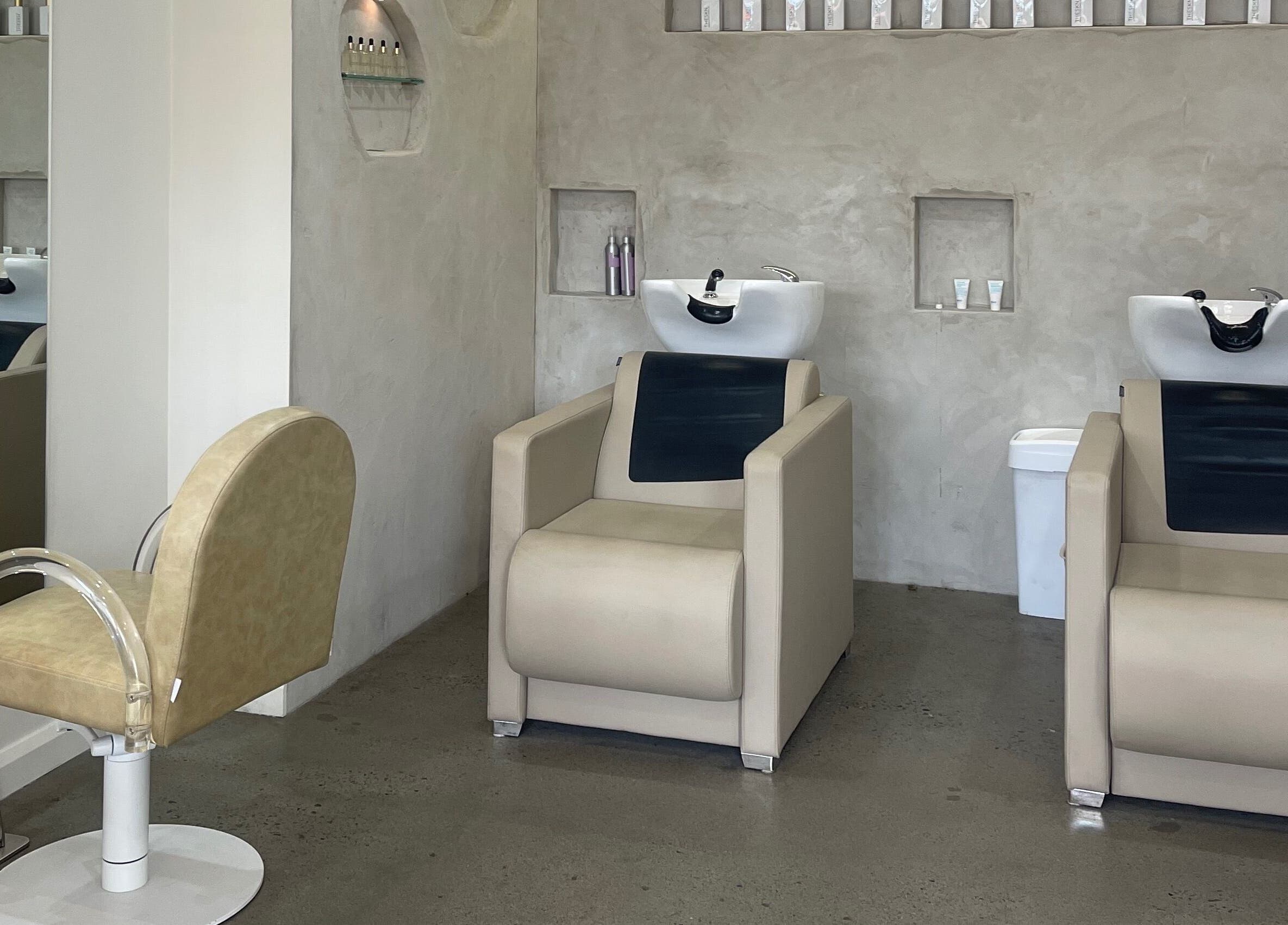 Modern washing and styling chairs at Bayse Hair Goldcoast, Nerang, Queensland, AU. Sleek, minimalist design.