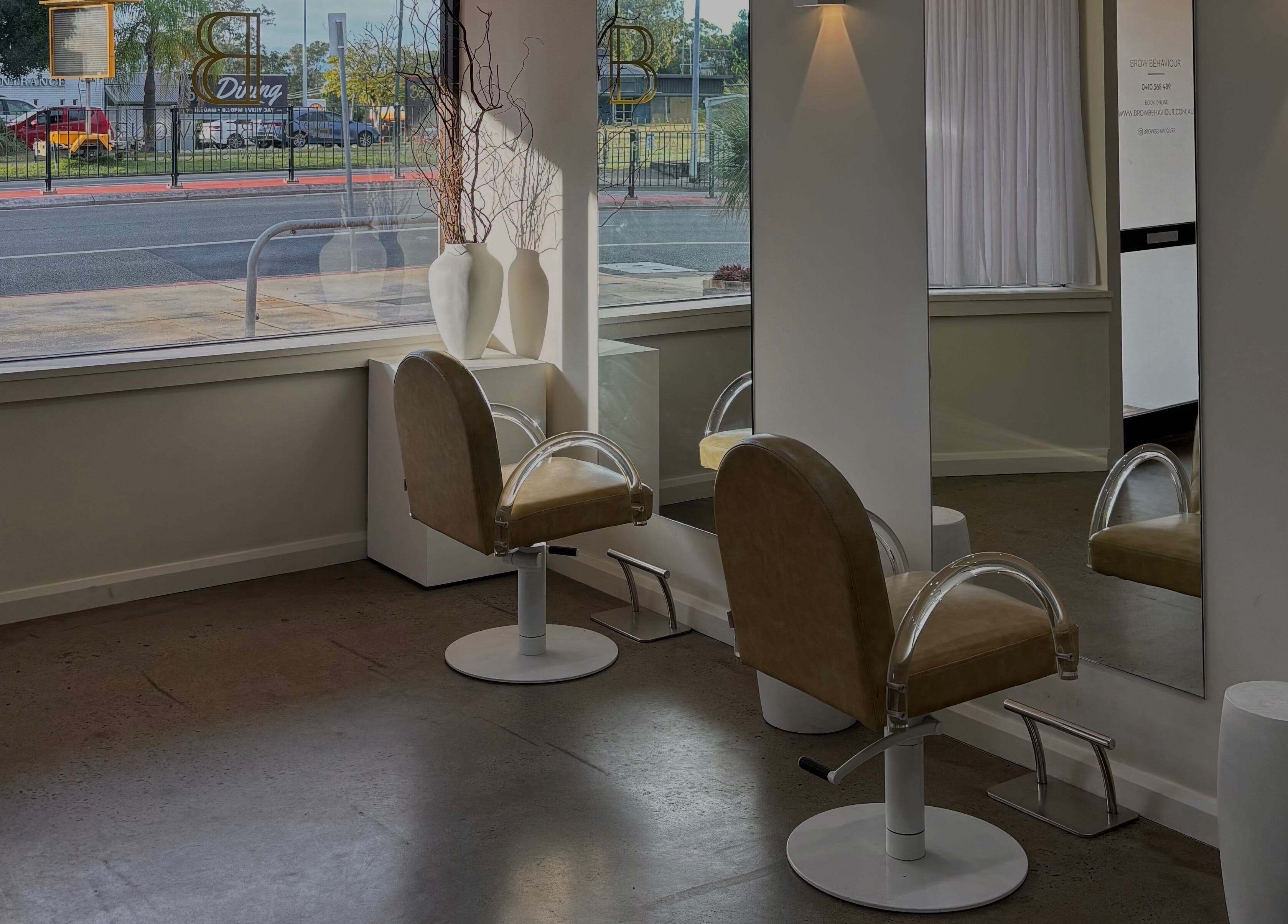 Elegant salon chairs in Bayse Hair Goldcoast, Nerang, Queensland, AU, offering a stylish and inviting atmosphere.