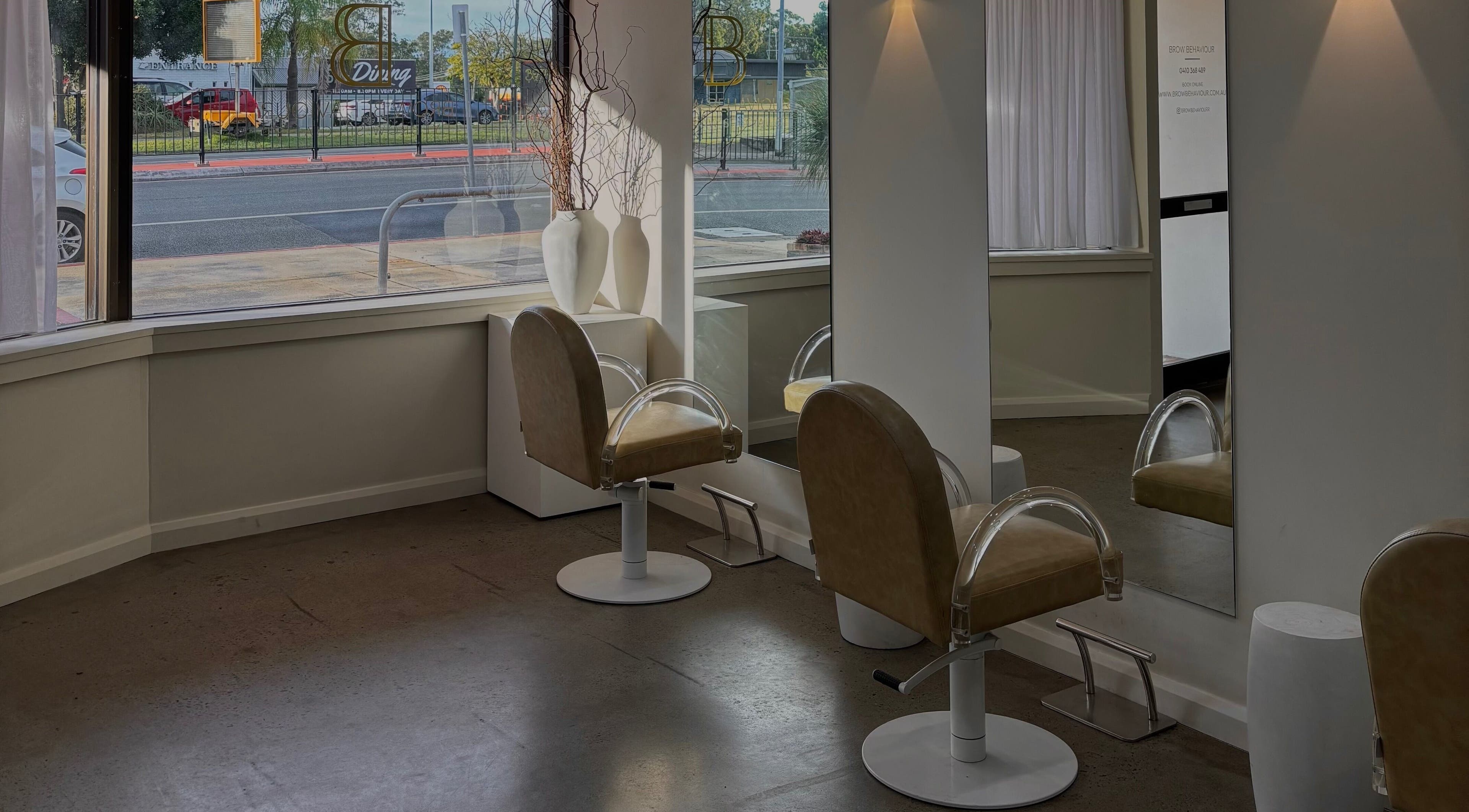 Elegant salon chairs in Bayse Hair Goldcoast, Nerang, Queensland, AU, offering a stylish and inviting atmosphere.