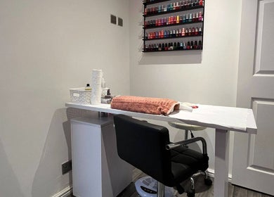 Nail care station at Mist Beauty, Southend-on-sea, England, GB with nail polish display.