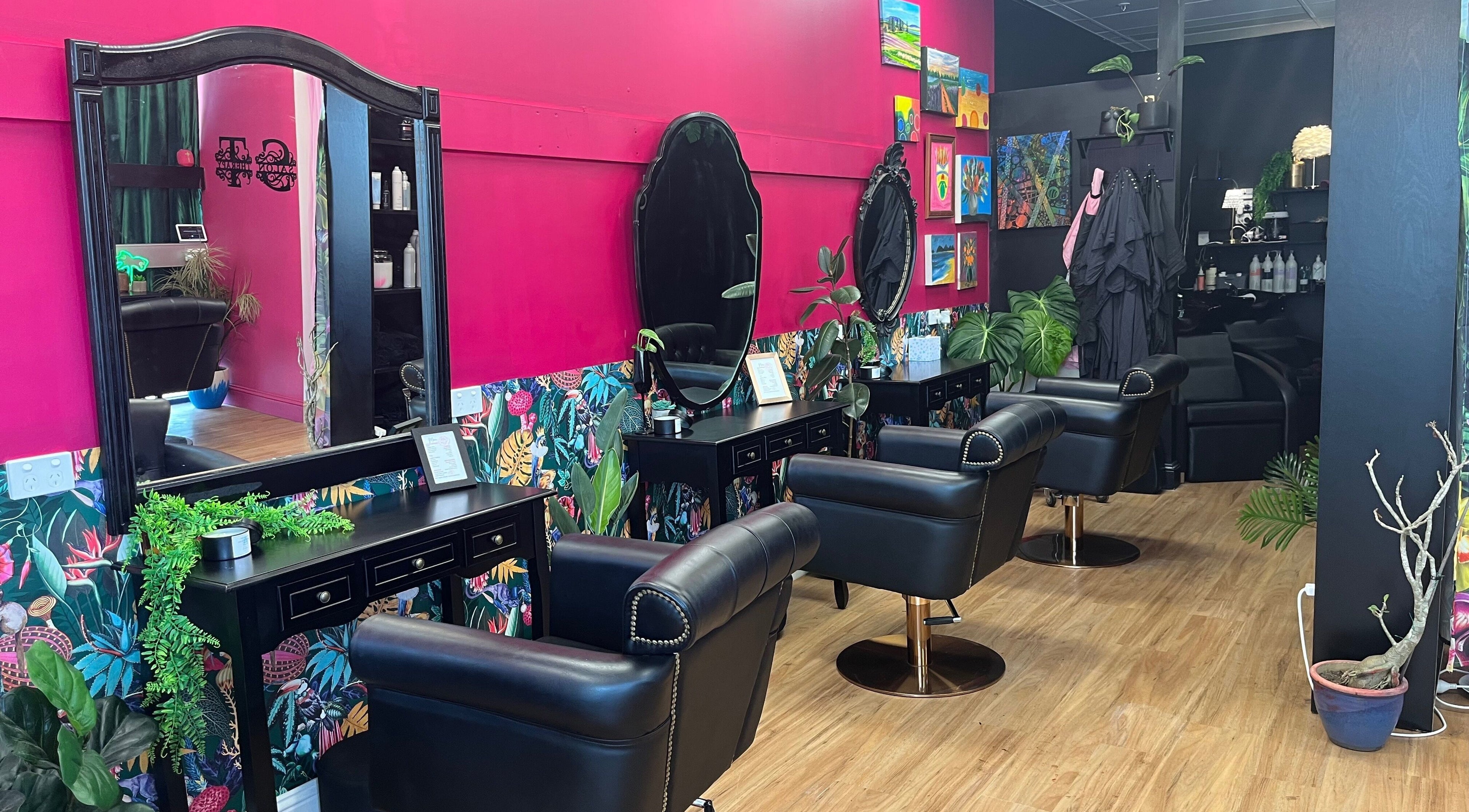 Bright and stylish interior of Salon Therapy with colorful decor in Manunda, Queensland, AU.