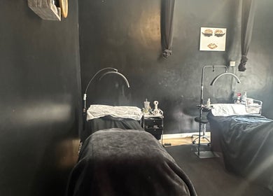 Calm treatment room at Haru Beauty in Wigan, England, GB with dim lighting and modern decor.
