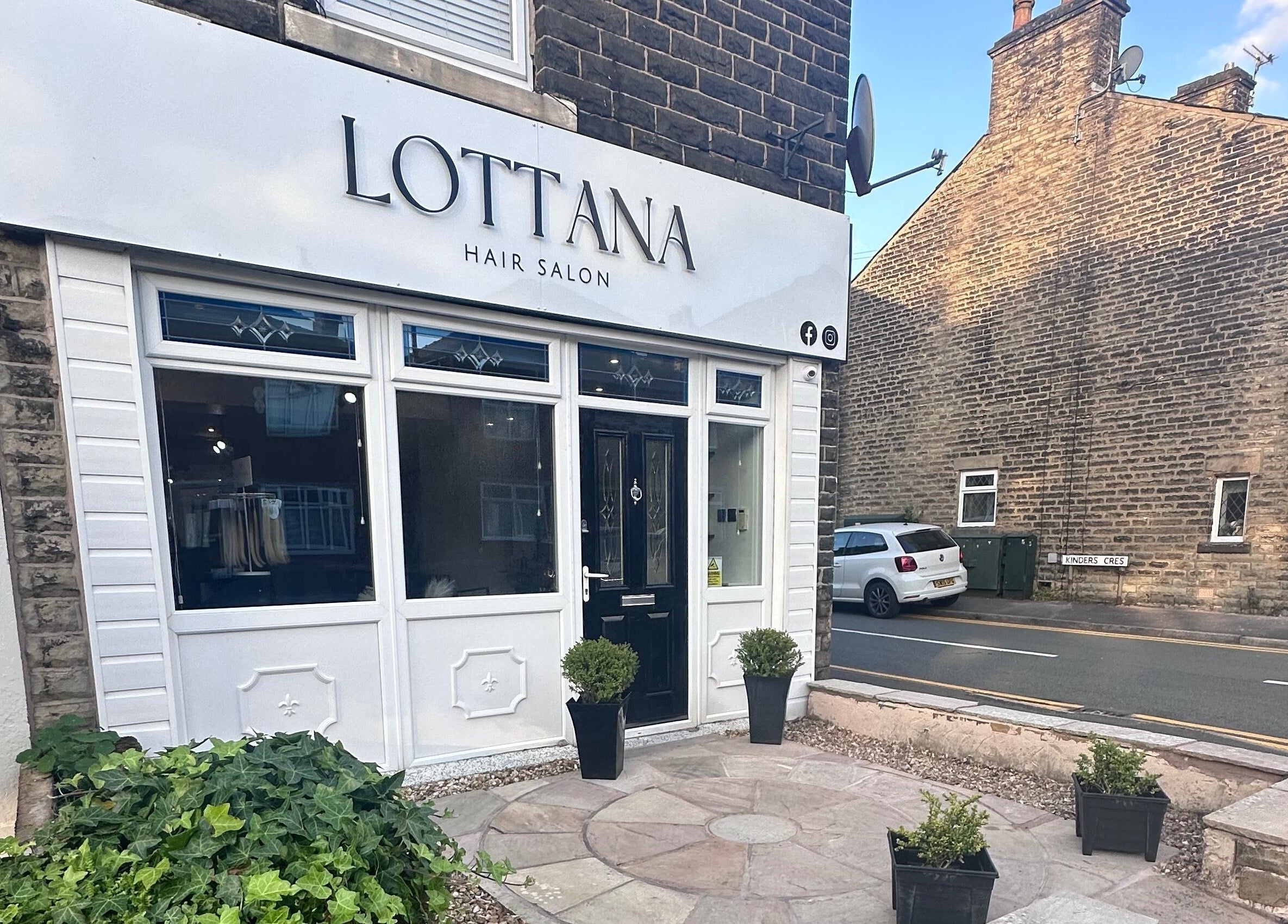 Exterior of Lottana Hair Salon in Greenfield, England, GB, showcasing its modern and inviting facade.