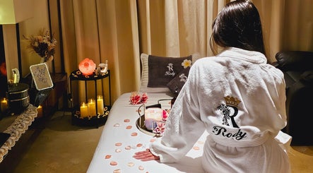 Relaxing scene at Rody Luxury Home Spa, Dubai, Dubai, AE. Luxurious treatment setting with candles.