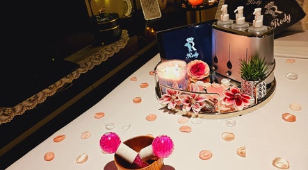 Luxurious spa setup with decor and candles at Rody Luxury Home Spa, Dubai, Dubai, AE.