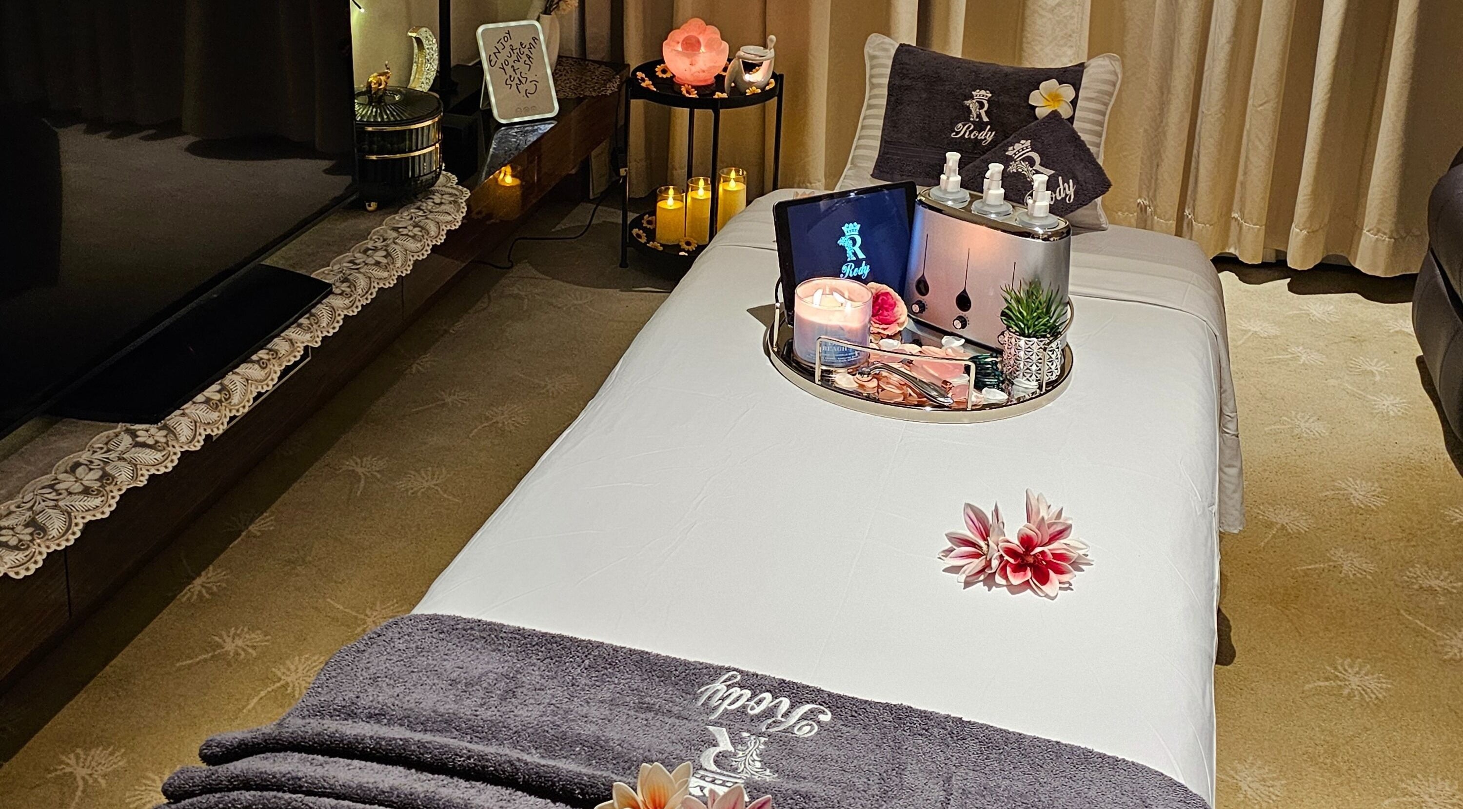 Cozy spa setup at Rody Home spa | home service, Dubai, Dubai, AE with plush towels and soothing decor.