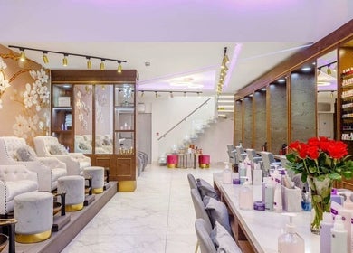 Elegant interior of Anna’s Hair and Beauty, London, England, GB showcasing luxurious seating and decor.