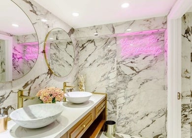 Luxurious marble bathroom at Anna’s Hair and Beauty, London, England, GB, featuring elegant decor.